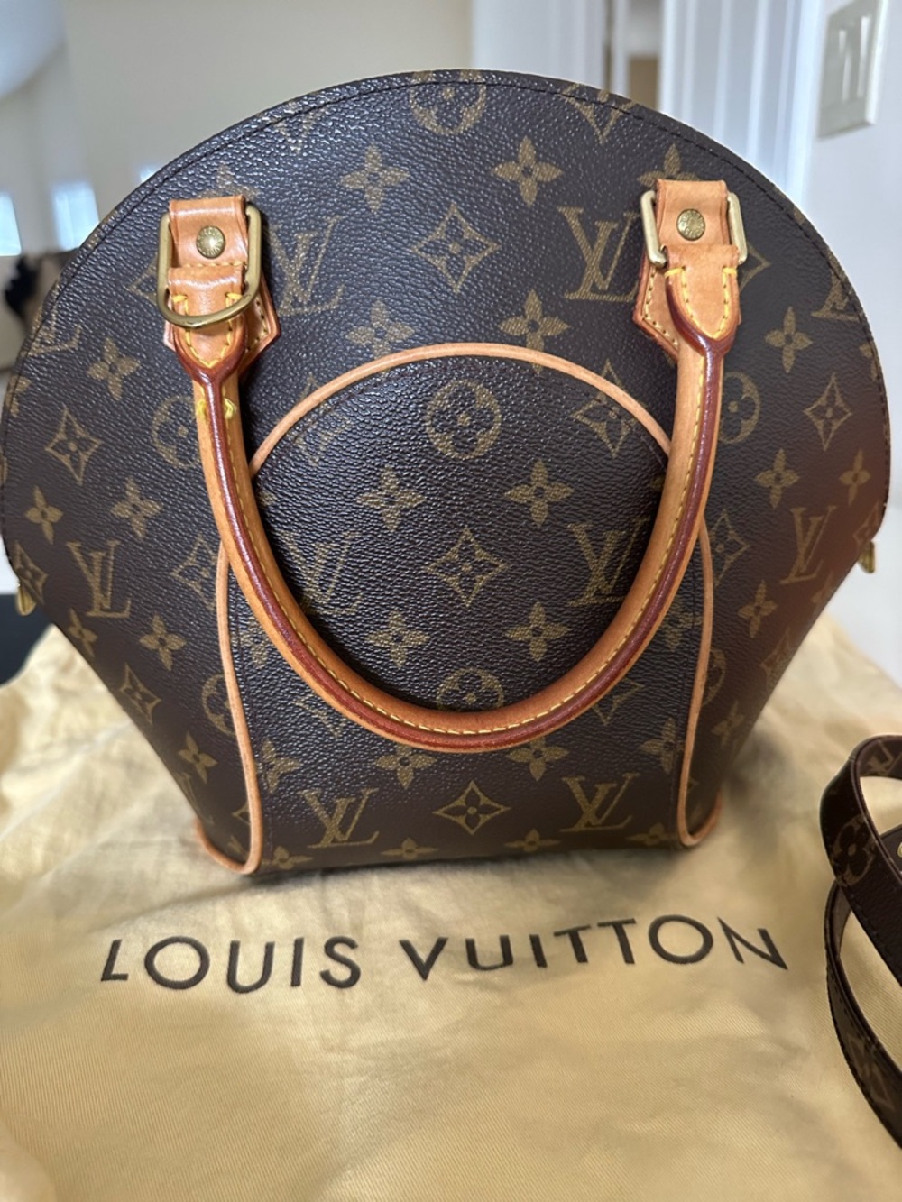 Louis Vuitton Brown Monogram Alma Satchel with Vachetta Trim